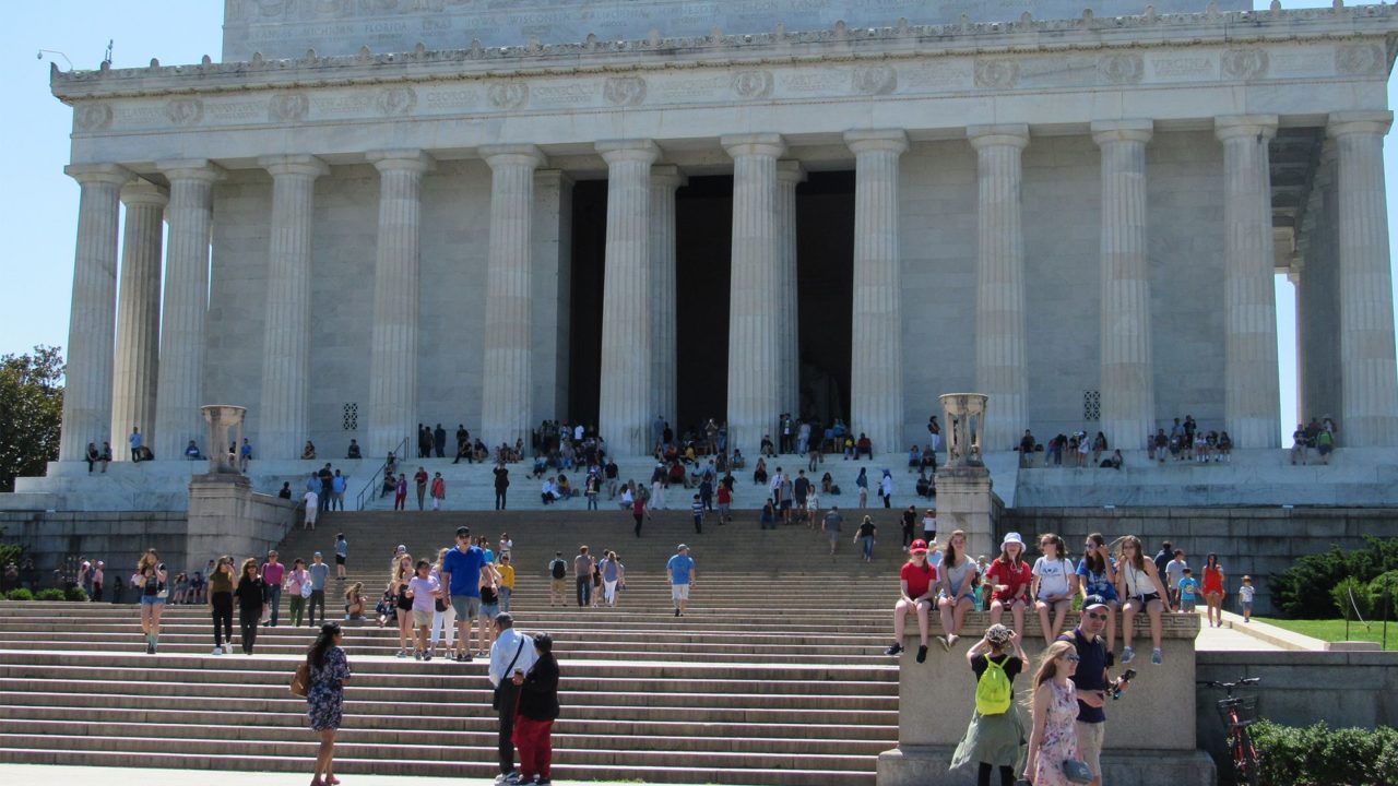 Front of Lincoln Memorial on a sunny summer afternoon.