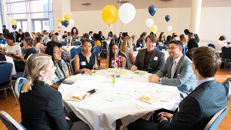 Students meet with program alumni during the Alumni Roundtable.