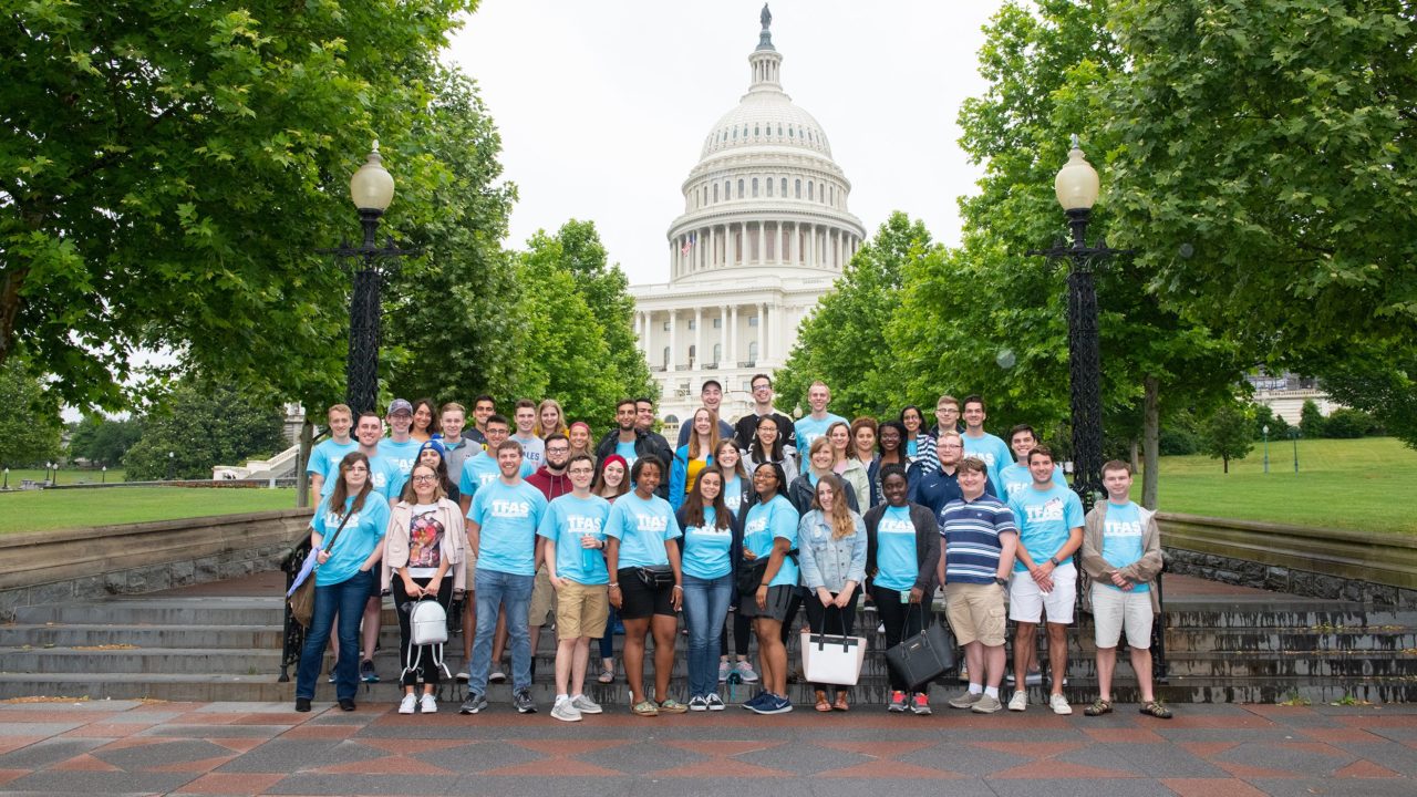 Students in front of the Capitol Building during a guided tour of the National Mall.
