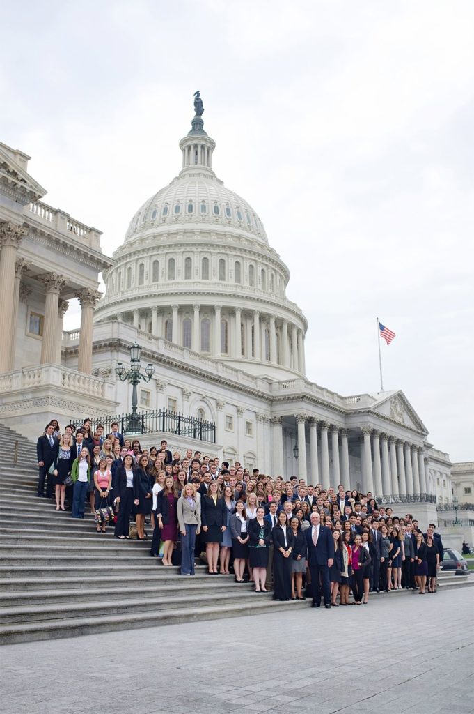 Student gather on the step of the Capitol after an exclusive briefing.