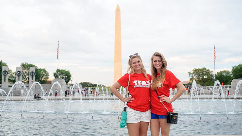 Students in front of the Washington Monument.