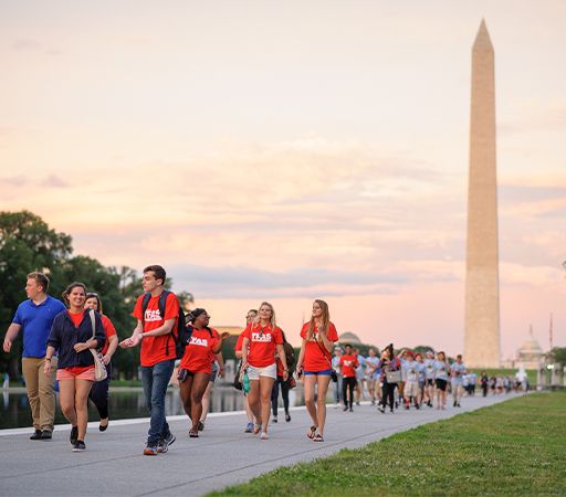 Students enjoying The National Mall at sunset. 